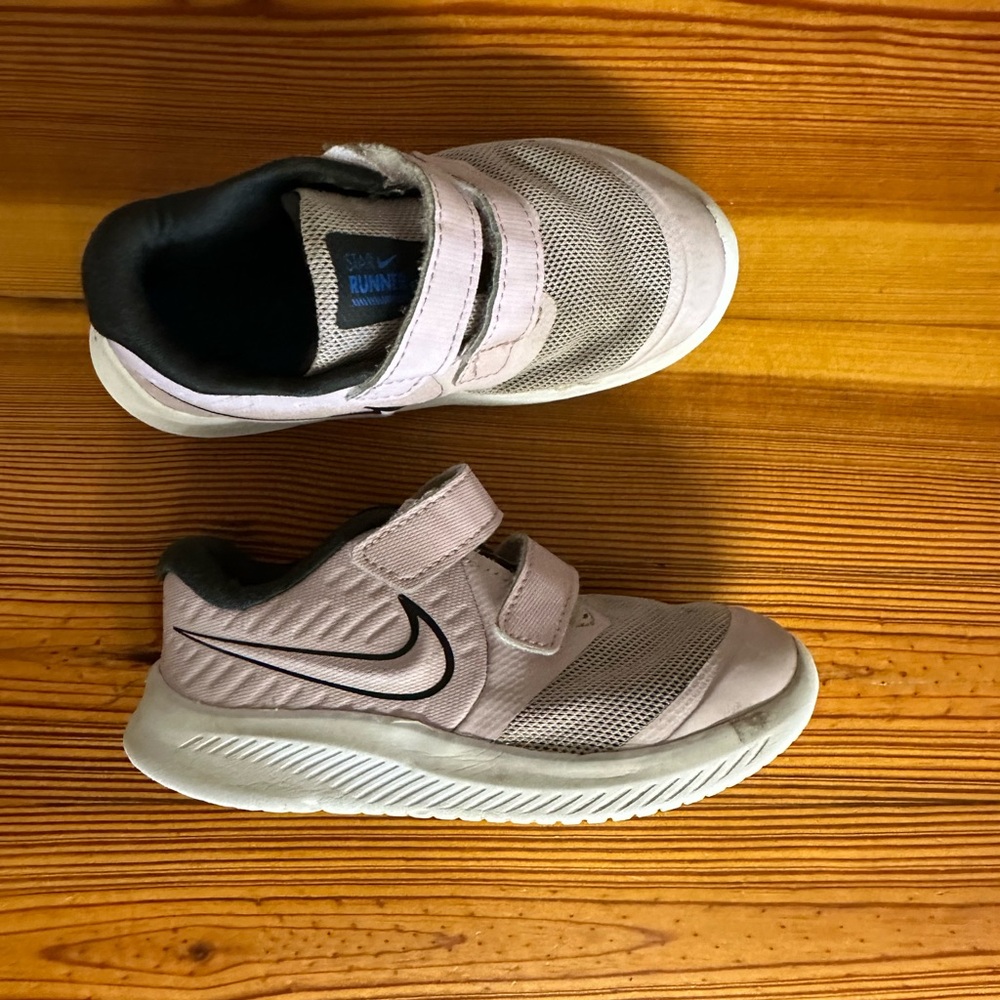 Light pink little girls Nike shoes.  Size 9